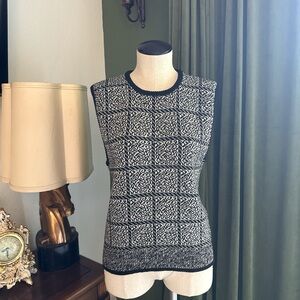 Elegant Black and White Sleeveless Blouse
